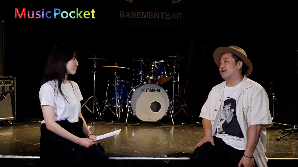 ヨシザワさんのインタビュー写真