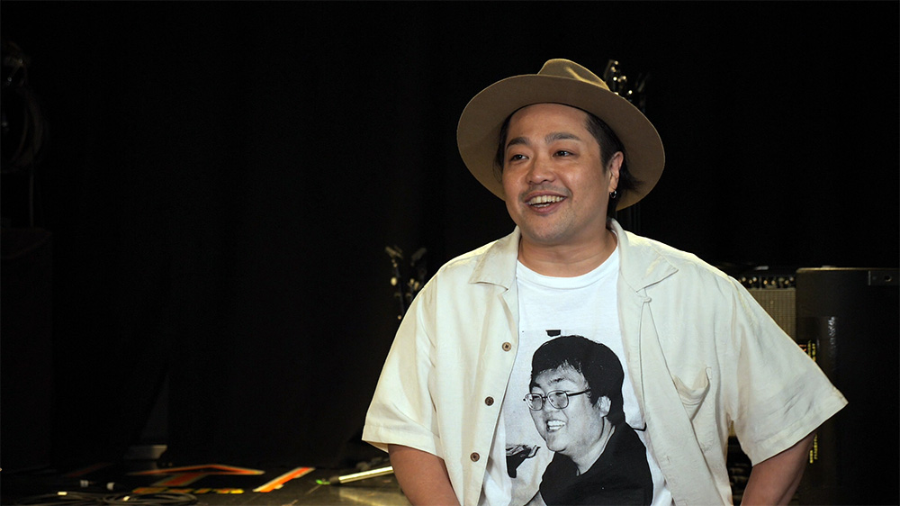 ヨシザワさんのインタビュー写真